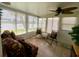 Bright enclosed lanai with lots of natural light and views of the water at 3890 Mainlands N Blvd, Pinellas Park, FL 33782