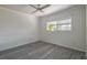 Bright bedroom with gray wood floors, complemented by a large window, offering a serene and inviting space at 4001 W North A St, Tampa, FL 33609