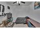 Cozy bedroom with a ceiling fan and minimalist decor, ideal for relaxation and rest at 4017 3Rd E Ave, Bradenton, FL 34208