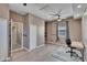 Spacious bedroom features ample space, hardwood flooring, a ceiling fan, and two closets for storage at 4017 3Rd E Ave, Bradenton, FL 34208