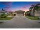Charming single-story home with a well-manicured lawn, mature landscaping, and a two-car garage at 4017 3Rd E Ave, Bradenton, FL 34208