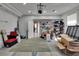 Finished garage featuring storage shelves, overhead lighting, and an interior access door to the main house at 4017 3Rd E Ave, Bradenton, FL 34208
