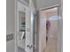 Hallway view to include a bonus room, closet and access to the home's main bedroom and ensuite bathroom at 4017 3Rd E Ave, Bradenton, FL 34208