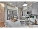 Well-appointed kitchen with stainless steel appliances, gray cabinets, and a convenient breakfast bar area at 4017 3Rd E Ave, Bradenton, FL 34208