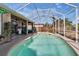 Inviting screened-in pool area with ample deck space, perfect for outdoor entertaining at 4017 3Rd E Ave, Bradenton, FL 34208