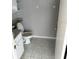 Bathroom with tile floor, white fixtures and ample space at 4031 Chesswood Dr, Holiday, FL 34691