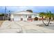 Charming single-story home featuring a one-car garage, tidy landscaping, and a welcoming front entrance at 4031 Chesswood Dr, Holiday, FL 34691