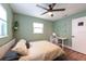 Bedroom with work space, closet, and lots of light at 4311 W Oklahoma Ave, Tampa, FL 33616