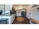 Well-appointed kitchen featuring stainless steel appliances, ample cabinet space, and stylish countertops for cooking at 4311 W Oklahoma Ave, Tampa, FL 33616