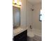 Bathroom with vanity, toilet, and a shower/tub combo featuring modern fixtures at 4410 19Th N St, St Petersburg, FL 33714