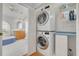 Bathroom and laundry featuring stacked washer/dryer and access to the bathroom at 4490 38Th S Way, St Petersburg, FL 33711