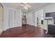 Bedroom with wood floors, closet, and bright white walls at 4490 38Th S Way, St Petersburg, FL 33711