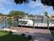 Waterfront home boasts a private dock with ample space for boat mooring and waterfront relaxation at 4490 38Th S Way, St Petersburg, FL 33711