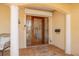 Front entrance featuring decorative stained glass, columns, and mosaic tile at 4490 38Th S Way, St Petersburg, FL 33711