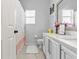 Bathroom featuring a walk-in shower, toilet, and white vanity with dual sinks at 4809 Walnut Ridge Rd, Land O Lakes, FL 34638