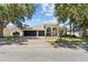 Charming home featuring a spacious three car garage and a brick paved driveway at 4809 Walnut Ridge Rd, Land O Lakes, FL 34638