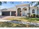Charming home with a spacious three car garage and a brick paved driveway at 4809 Walnut Ridge Rd, Land O Lakes, FL 34638
