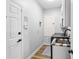 Functional laundry room featuring a utility sink, washer, and storage solutions at 4809 Walnut Ridge Rd, Land O Lakes, FL 34638