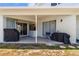 A covered patio provides outdoor living space, with sliding glass doors for seamless indoor-outdoor flow at 4809 Walnut Ridge Rd, Land O Lakes, FL 34638