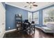 Home office with hardwood floors, a ceiling fan, and ample natural light at 5949 Parkset Dr, Lithia, FL 33547