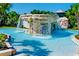 Resort-style pool with waterfall feature, perfect for relaxation and entertainment at 5949 Parkset Dr, Lithia, FL 33547