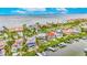 Stunning aerial view of waterfront homes with pools and boat docks in a tropical Florida community at 6301 Marbella Blvd, Apollo Beach, FL 33572
