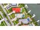 Expansive property with meticulous landscaping, including a backyard pool, and waterfront access at 6301 Marbella Blvd, Apollo Beach, FL 33572