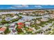 Waterfront property with a lush green lawn, providing direct access to the intercoastal waterway at 6301 Marbella Blvd, Apollo Beach, FL 33572
