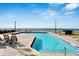 Sparkling pool with ocean view, perfect for relaxing and enjoying the Florida sunshine at 6301 Marbella Blvd, Apollo Beach, FL 33572