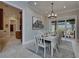 Dining room with a view of the pool and outdoor living at 6301 Marbella Blvd, Apollo Beach, FL 33572