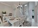 Dining room with a view of the front door and staircase at 6301 Marbella Blvd, Apollo Beach, FL 33572
