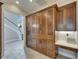 Convenient and discreet home office nook with built in cabinets and lighting at 6301 Marbella Blvd, Apollo Beach, FL 33572