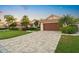 Beautiful one story home with well-manicured lawn and a paved driveway at 772 Live Oak Ne Ter, St Petersburg, FL 33703