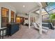 Entertainer's patio with outdoor bar, lounging, hot tub, and screened pool is perfect for gatherings at 772 Live Oak Ne Ter, St Petersburg, FL 33703