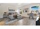 Stylishly decorated bedroom with modern furniture, wood-look floors, and natural light at 805 E Elm St, Tampa, FL 33604