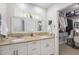 Bathroom with dual sinks, granite countertop and ample storage at 831 72Nd N Ave, St Petersburg, FL 33702