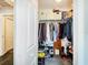 Walk-in closet featuring custom shelving and ample storage space at 8442 Pinewood Ave, Brooksville, FL 34613