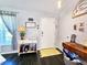 Bright foyer featuring dark wood floors and stylish decor elements at 8442 Pinewood Ave, Brooksville, FL 34613