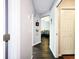 Hallway view into living room with hardwood flooring at 8442 Pinewood Ave, Brooksville, FL 34613
