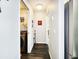 Hallway showing laundry room entrance at 8442 Pinewood Ave, Brooksville, FL 34613