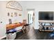 Cozy living area with sleek flooring, desk, and decor at 8442 Pinewood Ave, Brooksville, FL 34613