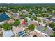 Aerial view showing the property's location near a lake in a residential neighborhood at 9504 Laurel Ledge Dr, Riverview, FL 33569