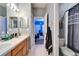 Bathroom features a dual sink vanity and a separate toilet at 9504 Laurel Ledge Dr, Riverview, FL 33569
