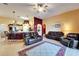 Open-concept living area seamlessly connects the living room and kitchen, creating an inviting space for Gathering and friends at 9504 Laurel Ledge Dr, Riverview, FL 33569