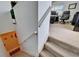 Stairway with a landing leading to a carpeted upstairs at 9504 Laurel Ledge Dr, Riverview, FL 33569