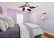Comfortable bedroom with decorative wall art and ample natural light at 102 Crestwood Ln, Largo, FL 33770