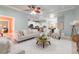 Spacious living room with open floor plan to the kitchen and dining area at 102 Crestwood Ln, Largo, FL 33770