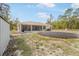 Backyard view with shed and patio at 10423 Sand Lark Ave, Weeki Wachee, FL 34614