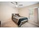 Bedroom featuring a ceiling fan and light at 10423 Sand Lark Ave, Weeki Wachee, FL 34614