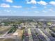 Neighborhood aerial view showcases the property's location near green spaces at 10814 Whitland Grove Dr, Riverview, FL 33578